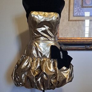 Strapless Gold Bubble Hem Party Dress with Black Bow